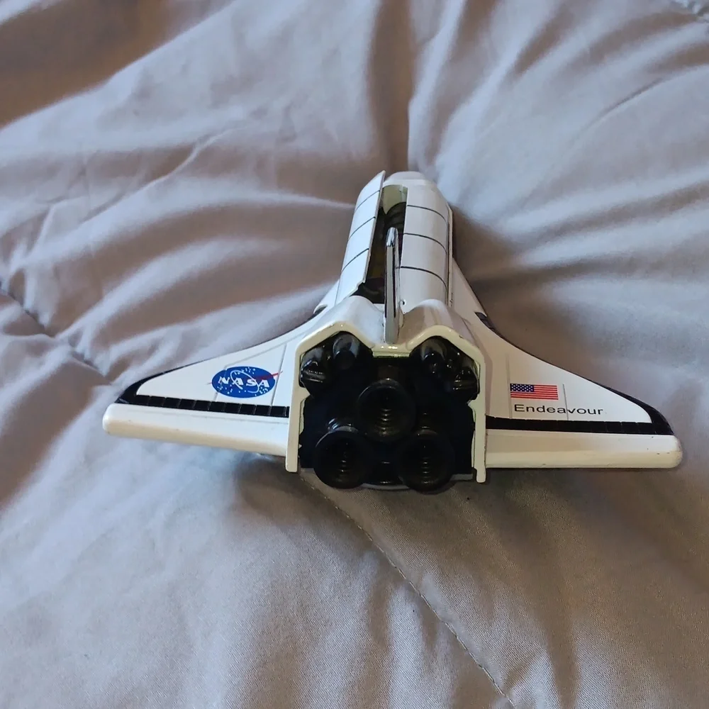 Rocket friction powered Endeavor Nasa metallic